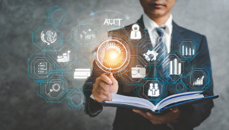 Businessman working with financial data on a virtual screen. Business concept.の素材