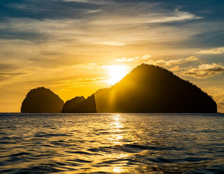 Beautiful sunrise over the sea at Ao Nang, Krabi, Thailandの素材