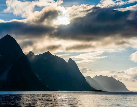 Sunset over a fjord in Lofoten islands, Norwayの素材