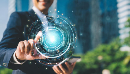 Businessman using digital hologram with blurred city background. Technology conceptの素材