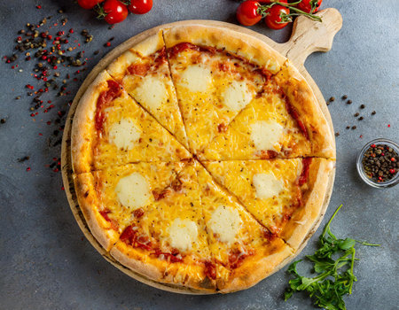 Pizza with mozzarella cheese, tomatoes and parmesanの素材