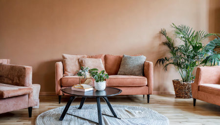 interior of modern living room with brown sofa, coffee table and plantsの素材