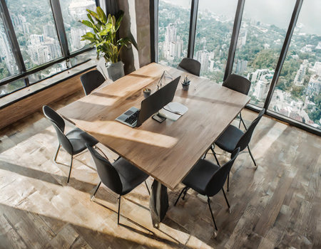 Office table and chairs in modern office with panoramic city viewの素材
