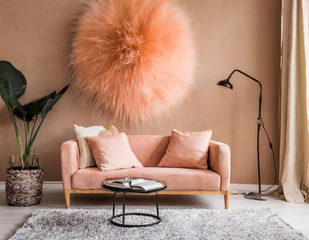 Interior of living room with beige sofa, floor lamp and plantの素材