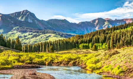 Mountain vista with Slate river in foreground near Crested Butte Colorado