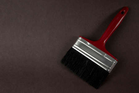 Top view of a 4 brush for painting on a brown backgroundの写真素材