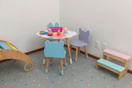 Childrens area in pediatric office, with a table and chairs for children to drawの写真素材