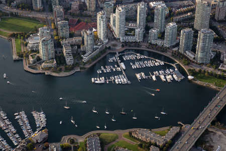 False Creek, Cambie Bridge, Marina, and Residential Buildings viewed from an aerial perspective in Downtown Vancouver, British Columbia, Canada.の写真素材