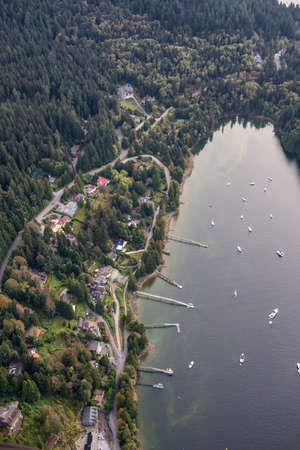 Aerial view on the luxury homes with a beautiful view on Indian Arm. Picture taken in Woodhaven, Vancouver, British Columbia, Canada, during a sunny day.の写真素材