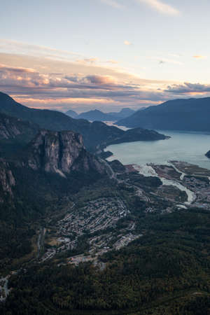 Aerial view of a small town, Squamish, in British Columbia, Canada, with the Chief Mountain and Howe Sound in the background.の写真素材
