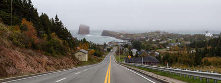 Panoramic view of a road leading to a beautiful modern town on the Atlantic Ocean Coast during a...