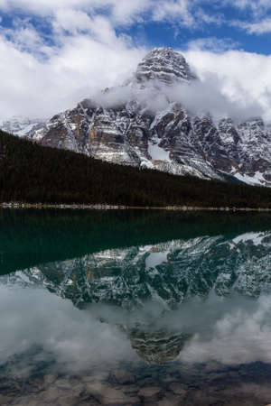 Beautiful Canadian Rockies Landscape during a cloudy day. Taken in Icefields Pkwy, Banff National Park, Alberta, Canada.の写真素材