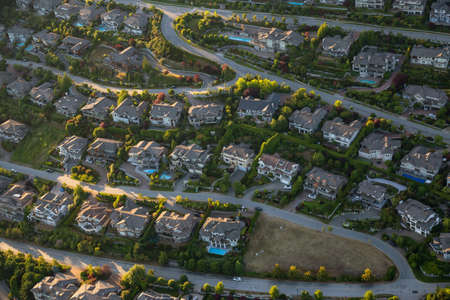 Aerial view of the big luxury homes on the hill during a vibrant sunny summer day. Taken in West Vancouver, British Columbia, Canada.の写真素材