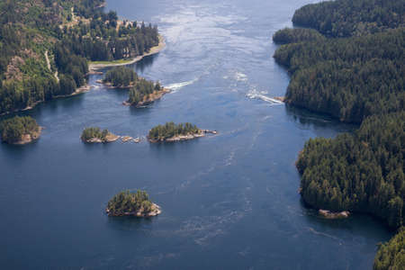 Aerial view of Skookumchuck Narrows  during a vibrant sunny summer day. Located in Sunshine Coast,...