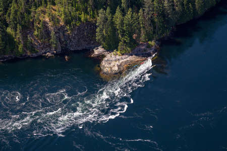 Aerial view of Skookumchuck Narrows  during a vibrant sunny summer day. Located in Sunshine Coast,...