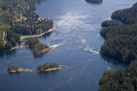 Aerial view of Skookumchuck Narrows  during a vibrant sunny summer day. Located in Sunshine Coast,...
