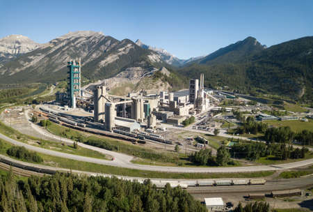 Aerial view of an industrial site in the Canadian Rockies during a vibrant sunny summer day. Taken near Calgary, Alberta, Canada.の写真素材