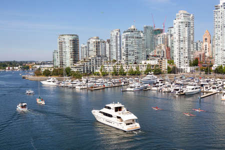 Vancouver, BC, Canada - August 5, 2018: Aerial view of False Creek during a sunny summer day.