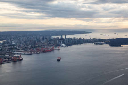 Aerial view of Downtown Vancouver during a cloudy summer evening. Located in British Columbia, Canada.の写真素材