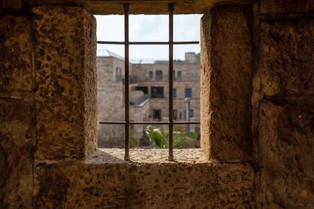 City Wall Watchtowers during a cloudy and sunny day. Taken in the Old City of Akko, Acre, Israel.
