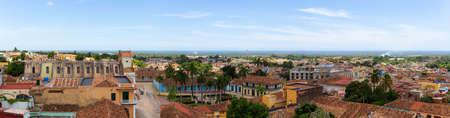 Aerial panoramic view of a small touristic Cuban Town during a sunny and cloudy summer day. Taken in Trinidad, Cuba.の写真素材