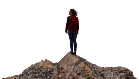 Adventure Girl on Top of a Rocky Peak. Isolated on White Background. Perfect for Landscape Composites. Concept: Adventure, Travel, Sport, Hike, Trekking, Nature, Lifestyleの写真素材