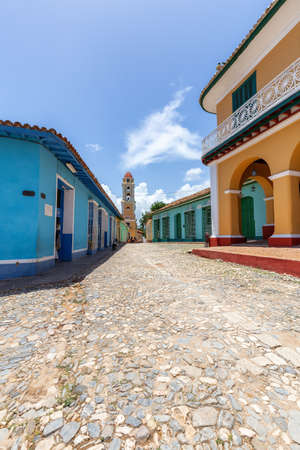 Trinidad, Cuba - June 9, 2019: Street View of an old Church in a small touristic Cuban Town during a vibrant sunny day.のeditorial素材