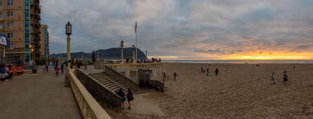 Seaside, Oregon, United States of America - September 6, 2019: Beautiful Panoramic View of the Seaside Beach during a dramatic and colorful summer sunset.のeditorial素材
