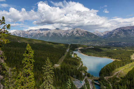 Beautiful View of Whitemans Pond during a vibrant summer day. Taken in Canmore, Alberta, Canada.の写真素材