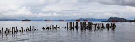 Astoria, Oregon, United States. Beautiful Panoramic View of the Columbia River during a cloudy summer morning.の写真素材
