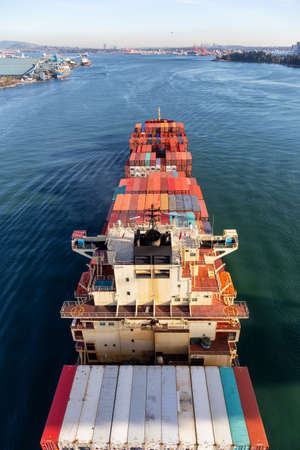 Vancouver, British Columbia, Canada - October 11, 2019: Aerial View from Above of a Cargo Ship...