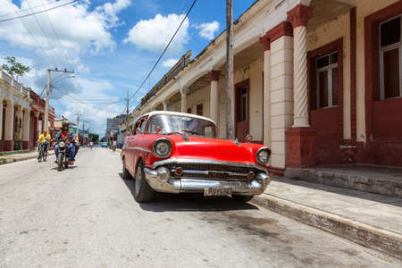 Ciego de Avila, Central Cuba - June 14, 2019: Urban Street view of a small Cuban Town during a cloudy and sunny summer day.のeditorial素材