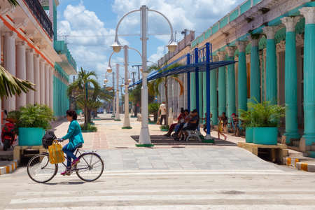 Ciego de Avila, Central Cuba - June 14, 2019: Beautiful view of a small Cuban Town during a cloudy and sunny summer day.のeditorial素材