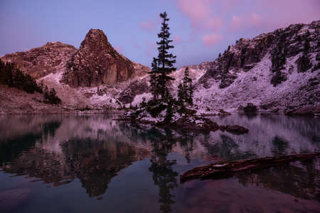 Beautiful View of a Glacier Lake in the Canadian Mountain Landscape during a colorful and vibrant sunset in Fall Season. Taken in Watersprite Lake, Squamish, North of Vancouver, BC, Canada.の写真素材