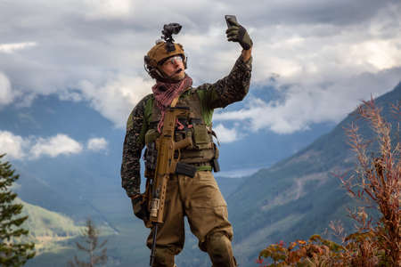 Chilliwack, British Columbia, Canada - October 5, 2019: Army Man wearing Tactical Uniform and...