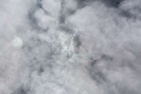 Aerial View from Above of a beautiful rocky beach covered in Clouds and Fog at the West Pacific Ocean Coast. Taken near Tofino and Ucluelet in Vancouver Island, BC, Canada.の写真素材