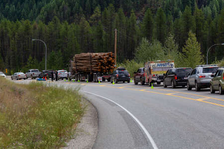Salmo, British Columbia, Canada - August 12, 2019: Big and Long Traffic Jamb caused by a Police Roadblock after Shambhala Music Festival.のeditorial素材