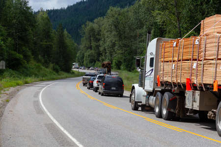 Salmo, British Columbia, Canada - August 12, 2019: Big and Long Traffic Jamb caused by a Police...