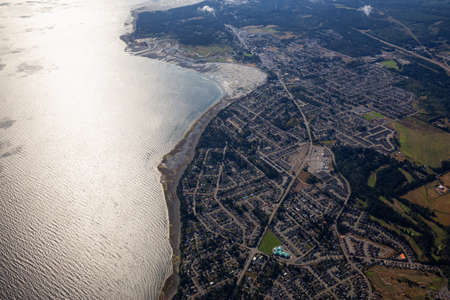Aerial view of a small town, Parksville, on Vancouver Island during a sunny summer morning. Taken near Nanaimo, British Columbia, Canada.の写真素材