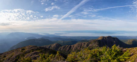 Beautiful Panoramic view of Canadian Mountain Landscape during a vibrant summer day. Taken at Mt Arrowsmith, near Nanaimo, Vancouver Island, BC, Canada.の写真素材