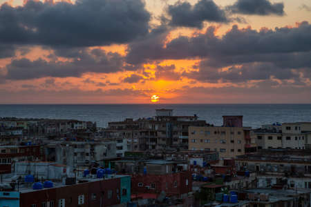 Aerial view of the residential neighborhood in the Havana City, Capital of Cuba, during a colorful sunset.の写真素材