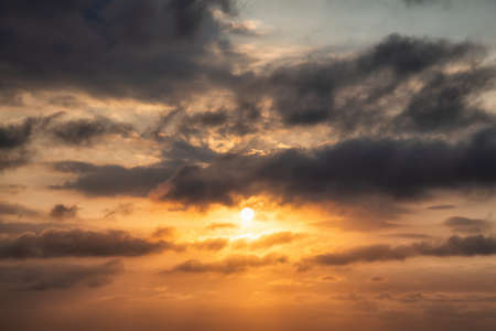 Dramatic View of a cloudscape during a dark and colorful sunset. Taken over Havana, Cuba.の写真素材