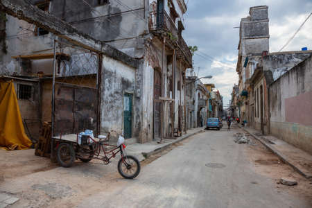 Havana, Cuba - May 29, 2019: Street view of the disadvantaged residential neighborhood in the Old Havana City, Capital of Cuba, during a bright and sunny day.のeditorial素材