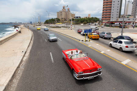 Havana, Cuba - May 23, 2019: Aerial View of an Old Classic American Car in the streets of the Old Havana City during a vibrant and bright sunny day.のeditorial素材