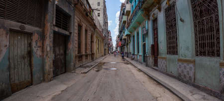 Havana, Cuba - May 29, 2019: Panoramic Street view of the disadvantaged residential neighborhood in the Old Havana City, Capital of Cuba, during a bright and sunny day.のeditorial素材