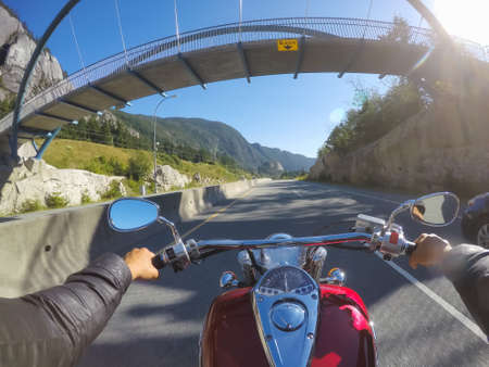 Riding on a motorcycle during a sunny summer day. Taken on Sea to Sky Highway in Squamish, North of...