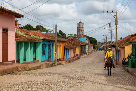 Trinidad, Cuba - June 08, 2019: Panoramic Street View of a small Cuban Town during a vibrant sunny day.のeditorial素材
