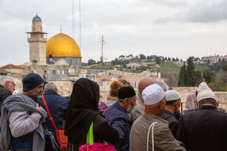 Jerusalem, Israel - April 2, 2019: Crowds of religious people at the Western Wall in the Old City...