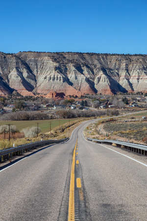 Scenic road in the desert during a vibrant sunny day. Taken on Route 12 near Cannonville, Utah, United States of America.の写真素材