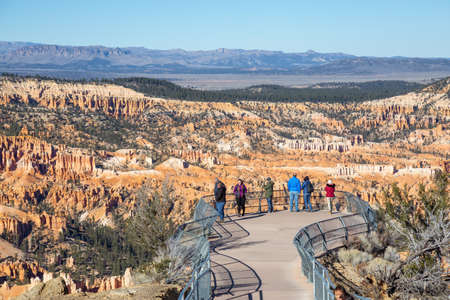 Bryce Canyon National Park, Utah, United States - November 12, 2018: People are looking at a Beautiful View of an American landscape during a sunny day.のeditorial素材